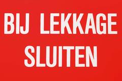 Sticker bij lekkage sluiten